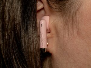 boAt Airdopes Joy v2 TWS Earbuds in Dusty Rose color with charging case