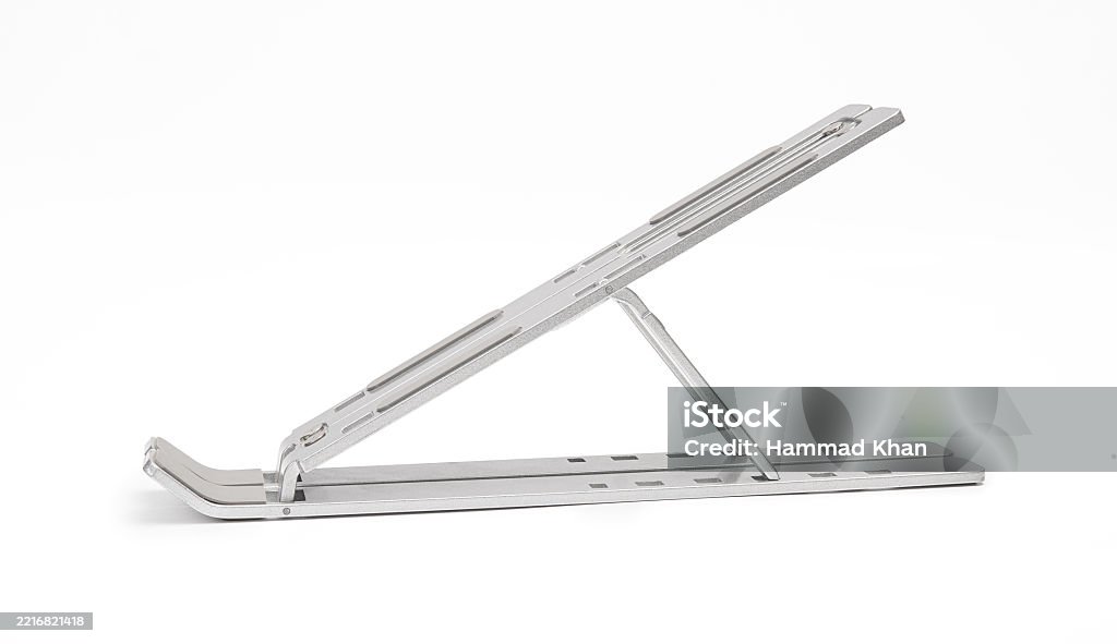 Dyazo silver adjustable aluminum portable laptop stand setup on a wooden office desk.